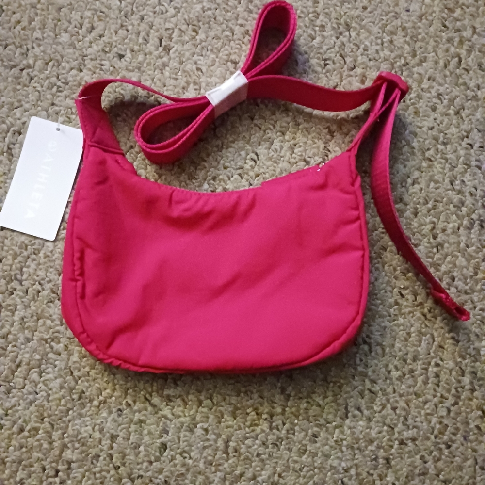 Athleta Pink All About Mini Crescent Bag. Power Of She